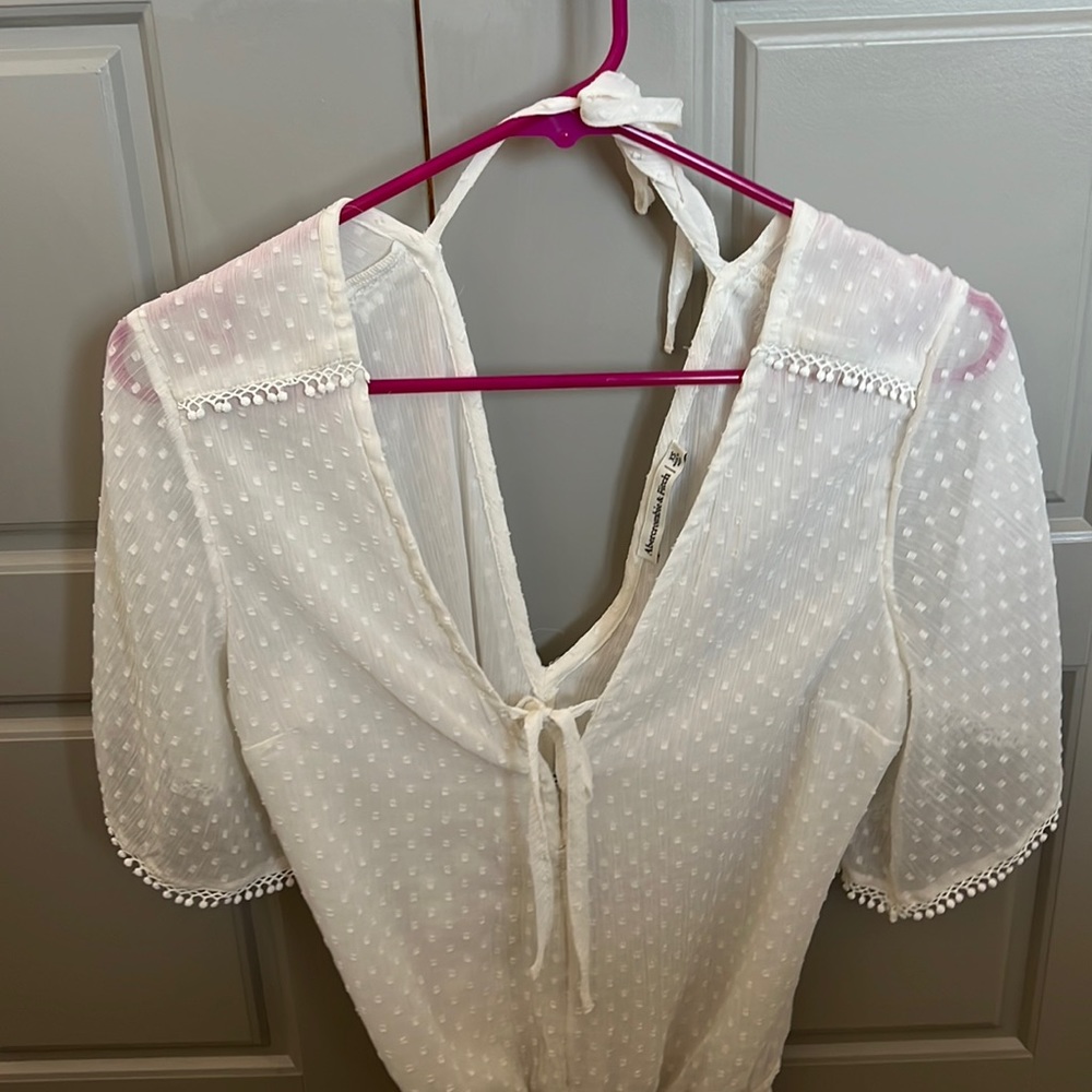 Size XS white polka dot bodysuit from Abercrombie